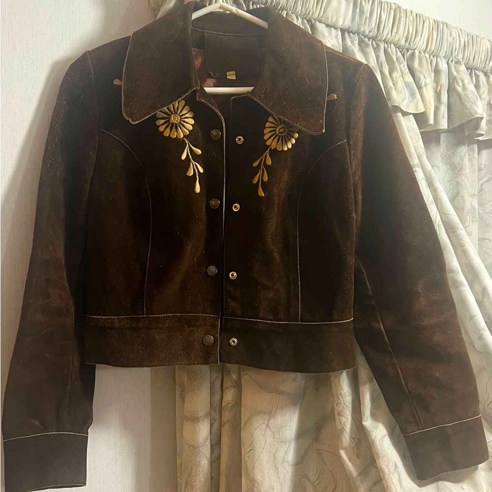 Vintage brown suede jacket with embroidered details.
